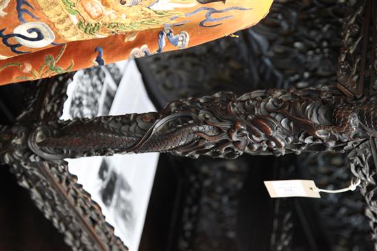 A Chinese black lacquered rosewood cabinet, late 19th century, W.3ft 9in. H.7ft D.1ft 5in.